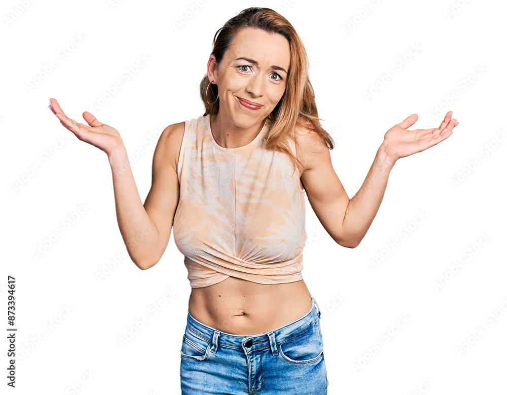 Young caucasian woman wearing casual style with sleeveless shirt clueless and confused with open arms, no idea and doubtful face. Young caucasian woman wearing casual style with sleeveless shirt clueless and confused with open arms, no idea and doubtful face.