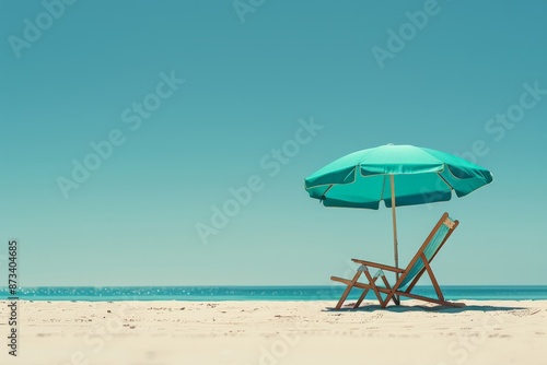 A minimalistic scene features a blue umbrella and lounge chair on a pristine beach, offering solitude and relaxation facing the vast expanse of the turquoise ocean.