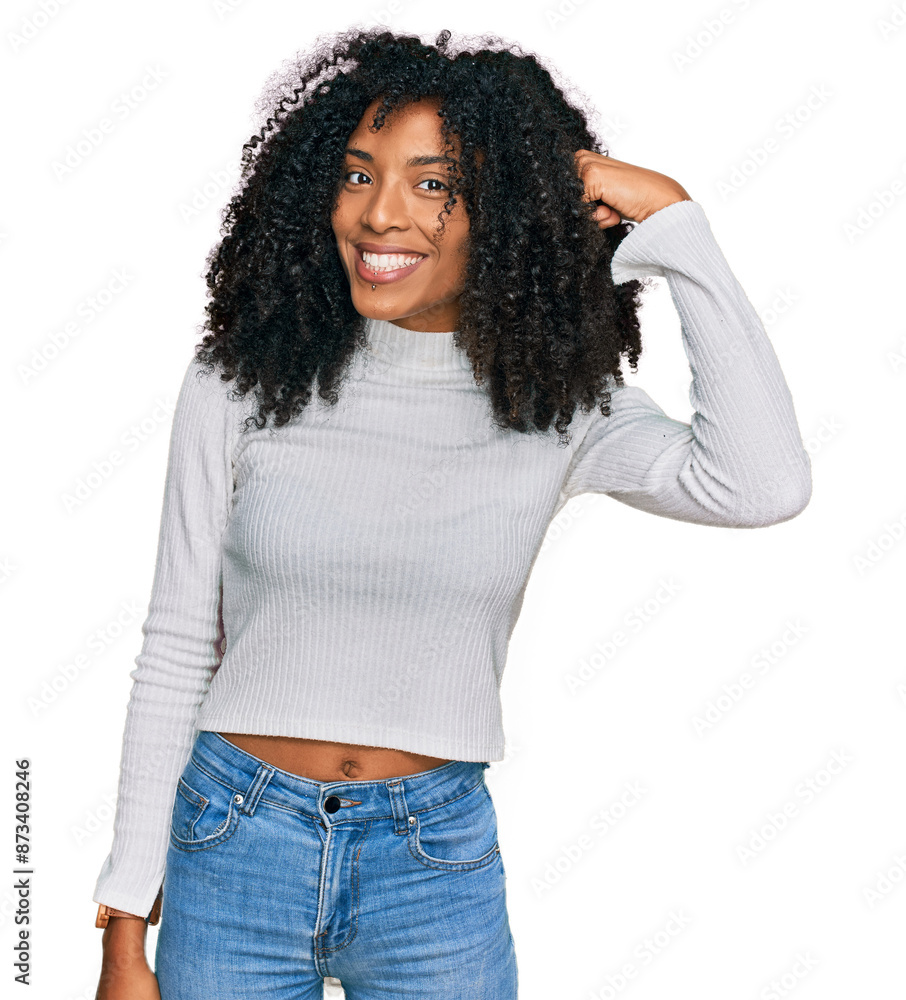 Young african american girl wearing casual clothes smiling pointing to head with one finger, great idea or thought, good memory Young african american girl wearing casual clothes smiling pointing to head with one finger, great idea or thought, good memory