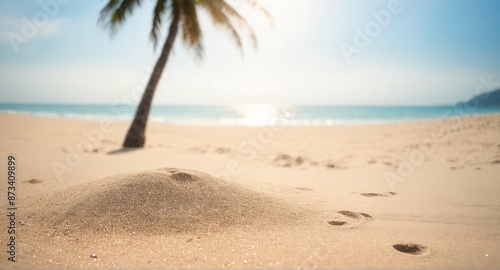 Sand with blurred Palm and tropical beach bokeh background Summer vacation and travel concept