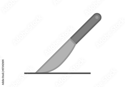 Cuchillo gris de cocina cortando