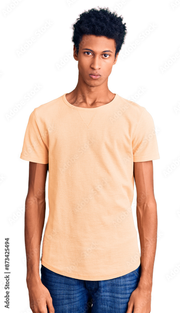 Young african american man wearing casual clothes skeptic and nervous, frowning upset because of problem. negative person. Young african american man wearing casual clothes skeptic and nervous, frowning upset because of problem. negative person.