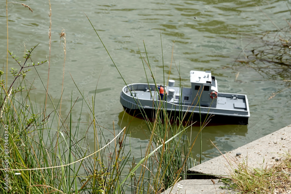 Model of a ship sailing in the pond Model of a ship sailing in the pond