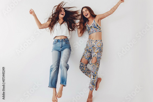  Full length photo of barefoot laughing funky girls