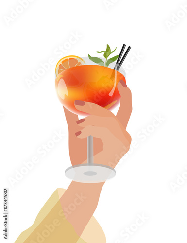 Aperol spritz cocktails with orange slice in the hand of woman. Summer cocktail.