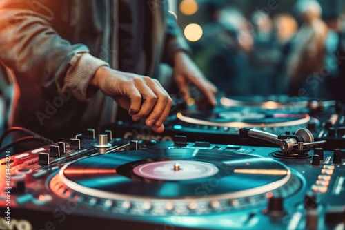 a dj mixing music at a party © Sergei