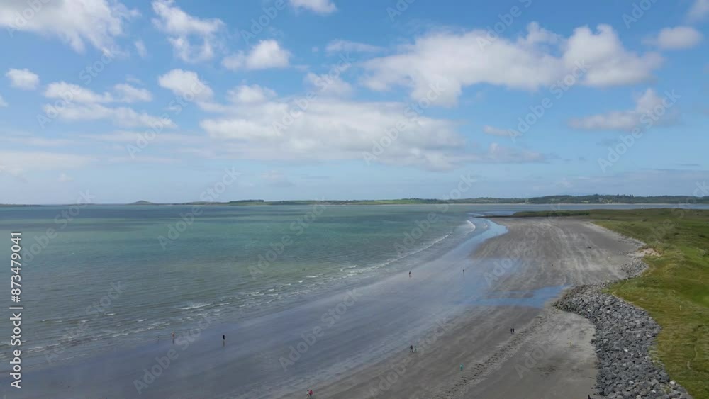 The golden beach, blue sky and crystal clear water, Atlantic ocean, Rosses Point, Sligo, Ireland The golden beach, blue sky and crystal clear water, Atlantic ocean, Rosses Point, Sligo, Ireland