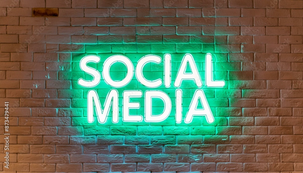 Obraz premium A green neon social media sign on a brick wall glowing 