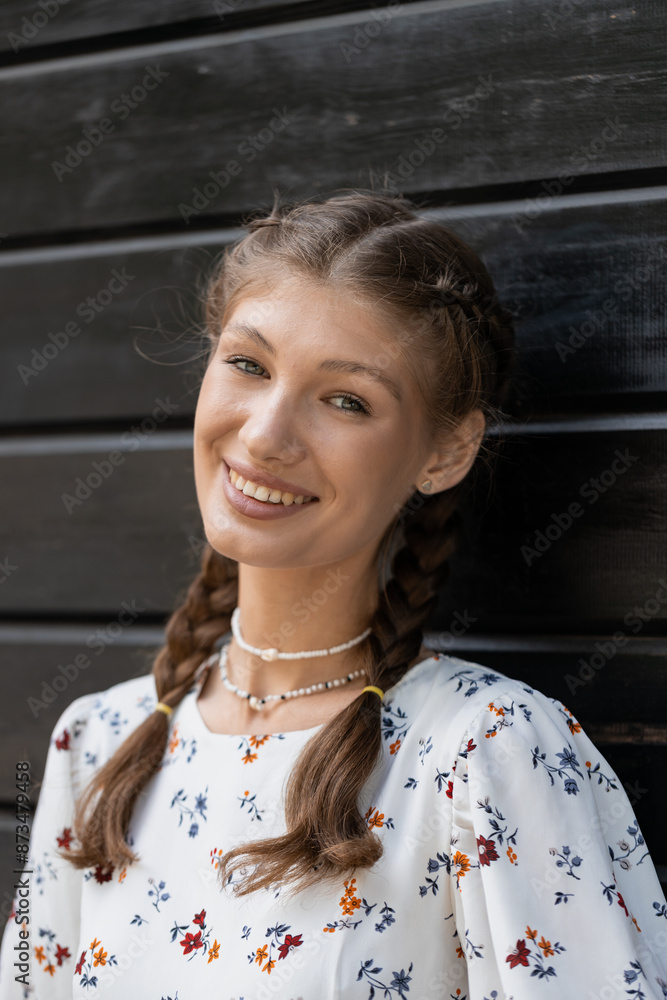 Attractive young caucasian woman is enjoying warm sunny weather walking outside. Brown-haired. Relaxation concept Attractive young caucasian woman is enjoying warm sunny weather walking outside. Brown-haired. Relaxation concept
