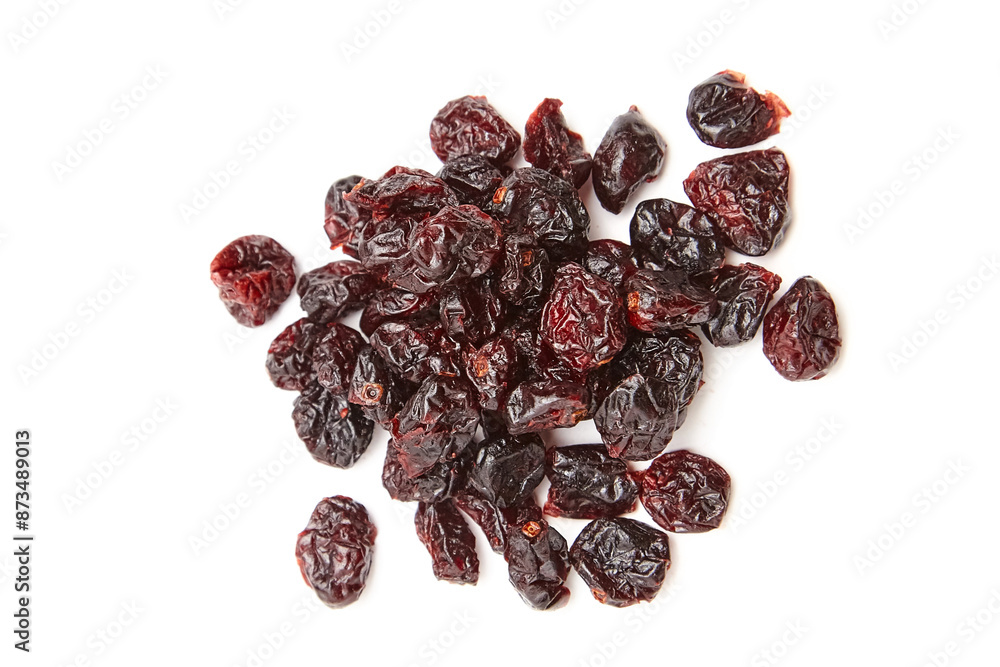 A scattered pile of dried cranberries isolated on a white background, highlighting their rich red and dark hues with a wrinkled texture. Ideal for healthy snacking and culinary uses