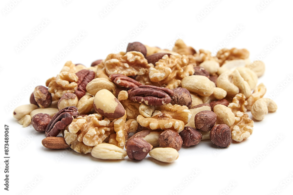 A pile of assorted mixed nuts including walnuts, pecans, almonds, Brazil nuts, hazelnuts, and cashews isolated on a white background. Perfect for healthy snacking or cooking A pile of assorted mixed nuts including walnuts, pecans, almonds, Brazil nuts, hazelnuts, and cashews isolated on a white background. Perfect for healthy snacking or cooking