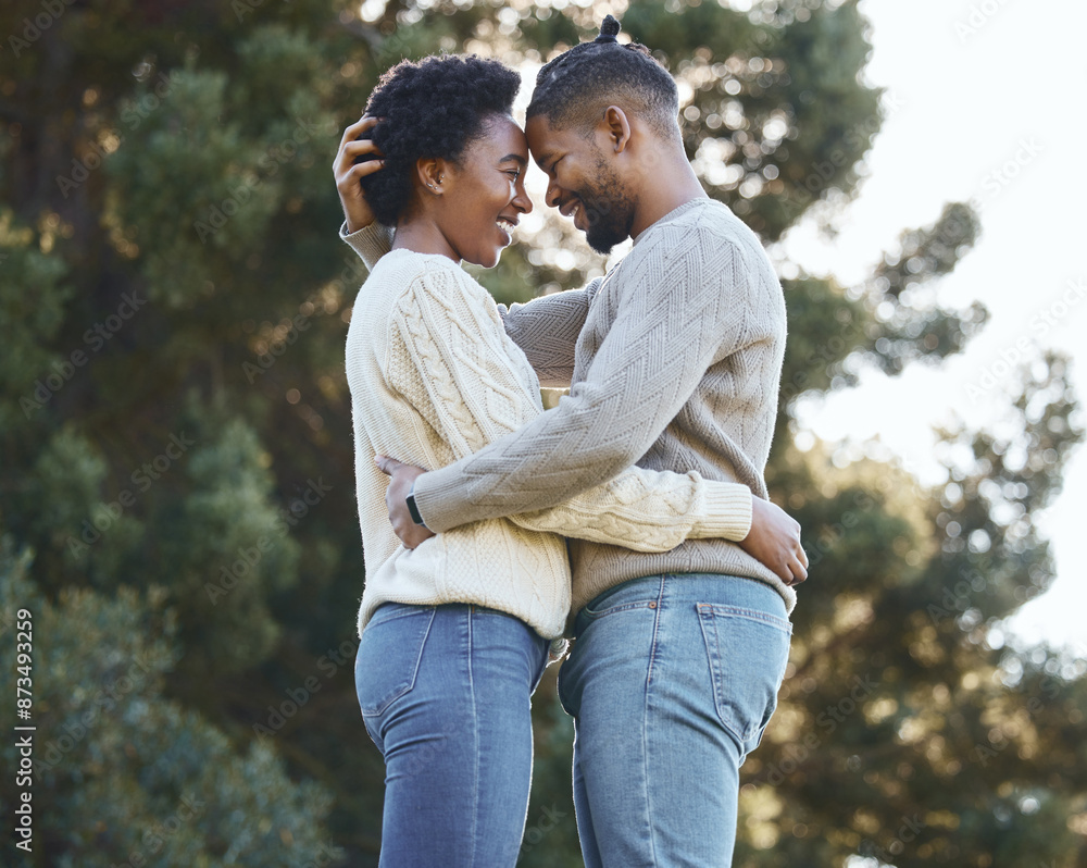 Fototapeta premium Love, hug and happy couple in countryside for care, holiday and adventure or winter camping trip. Black man, woman and embrace outdoor for support, comfort and together with sunshine in forest