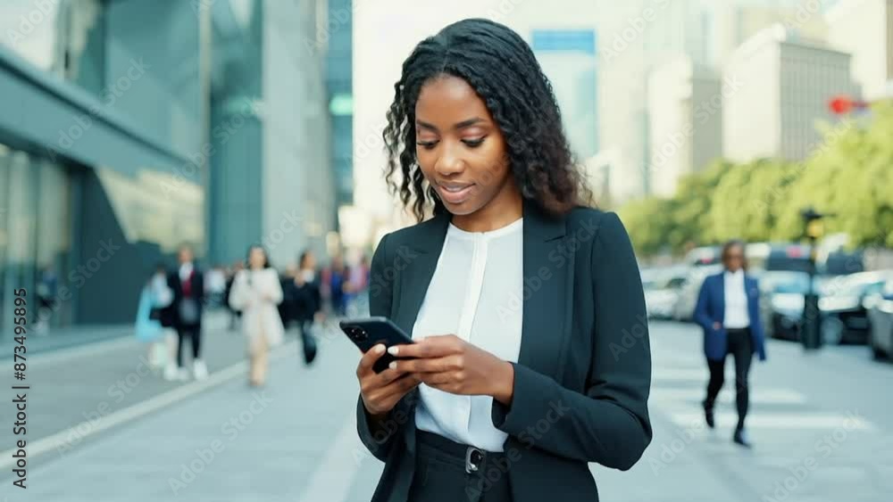 Young woman walking street using smartphone Young woman walking street using smartphone