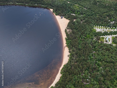 Loch Morlich, Glenmore, Scotland's only fresh water award winning beach is situated at the foot of the Cairngorms, right at the heart of the National Park photo