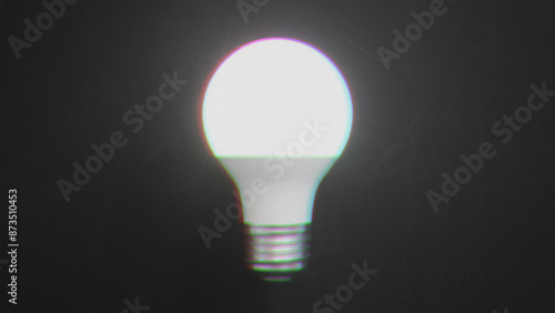 Grungy background with glowing led light bulb in darkness. Creepy mystic concept. 3D rendering.