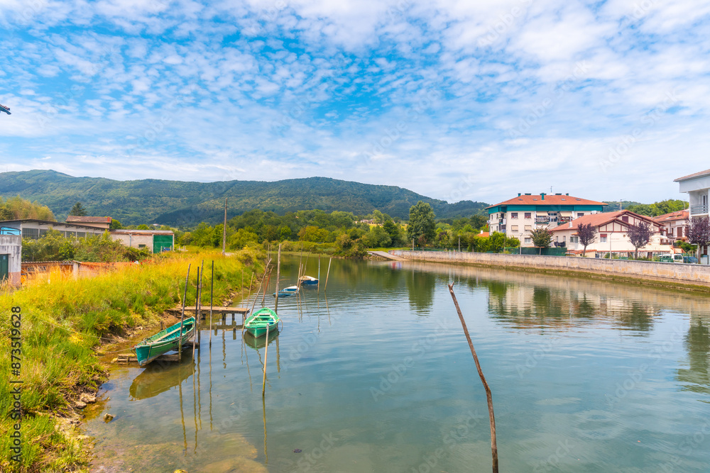 Fototapeta premium River at the beginning of the Jaizubia marsh in the town of Hondarribia or Fuenterrabia in Gipuzkoa. Basque Country
