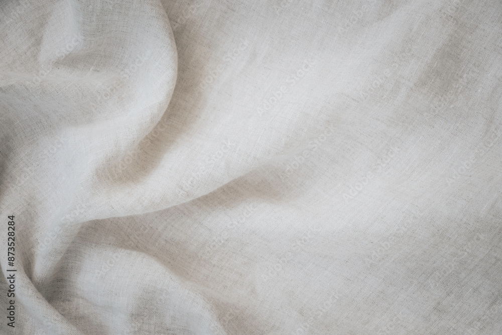 Abstract linen fabric texture background. Natural white linen fabric background with draperies. Top view, copy space Abstract linen fabric texture background. Natural white linen fabric background with draperies. Top view, copy space