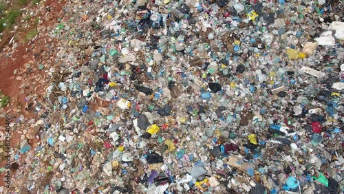 Aerial view of an open dump, a method of disposing of solid waste that causes great environmental impact, pollutes the soil and contaminates water - Campo Belo, Minas Gerais, Brazil