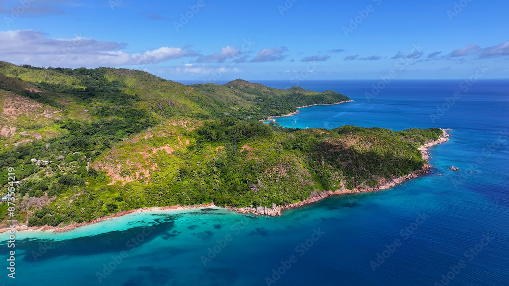 Anse Boudin Beach At Praslin Island In Victoria Seychelles. Indian Ocean Landscape. Beach Paradise. Praslin Island At Victoria. Seascape Outdoor. Archipelago Background. Tourism Travel. Anse Boudin Beach At Praslin Island In Victoria Seychelles. Indian Ocean Landscape. Beach Paradise. Praslin Island At Victoria. Seascape Outdoor. Archipelago Background. Tourism Travel.
