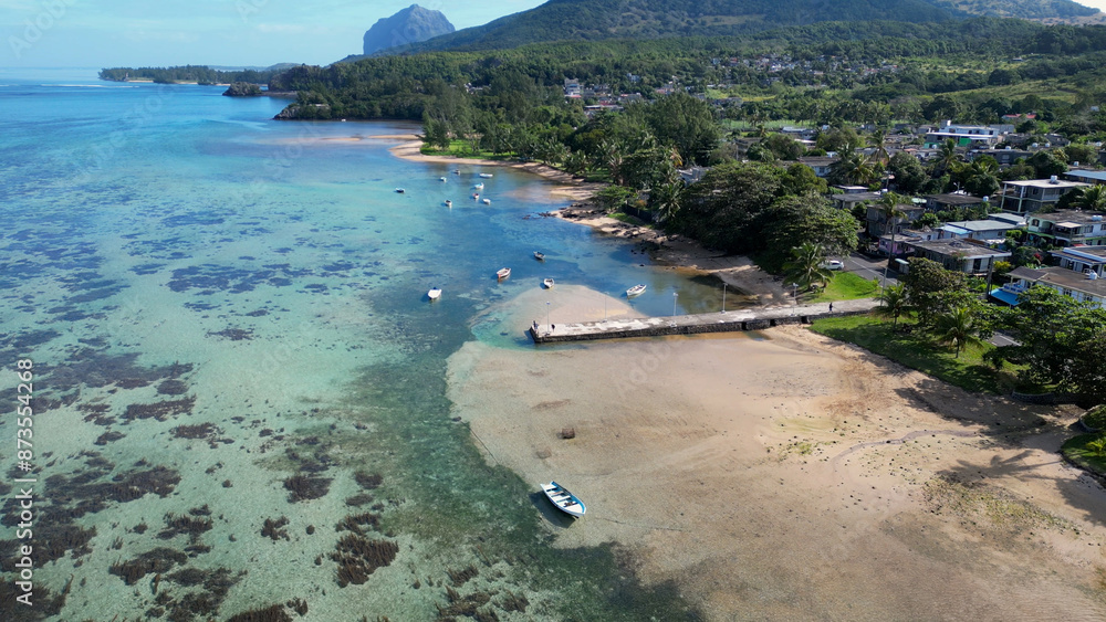 Obraz premium Harbor Pier At Baie Du Cap Beach In Mauritius Island Mauritius. Indian Ocean Beach. Africa Background. Baie Du Cap Beach At Mauritius Island Mauritius. Tourism Landscape. Nature Seascape.
