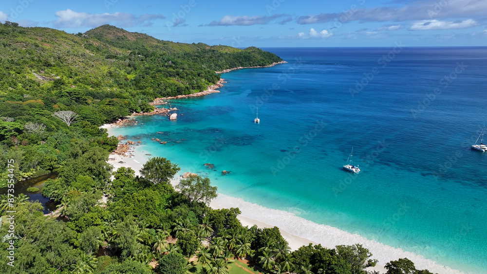 Naklejka premium Anse Lazio Beach At Praslin Island In Victoria Seychelles. Indian Ocean Landscape. Beach Paradise. Praslin Island At Victoria. Seascape Outdoor. Archipelago Background. Tourism Travel.