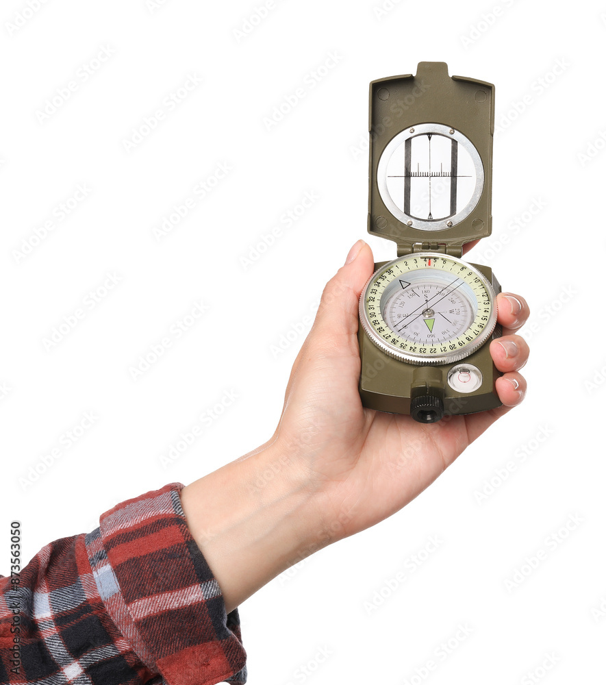 Woman holding compass on white background, closeup Woman holding compass on white background, closeup