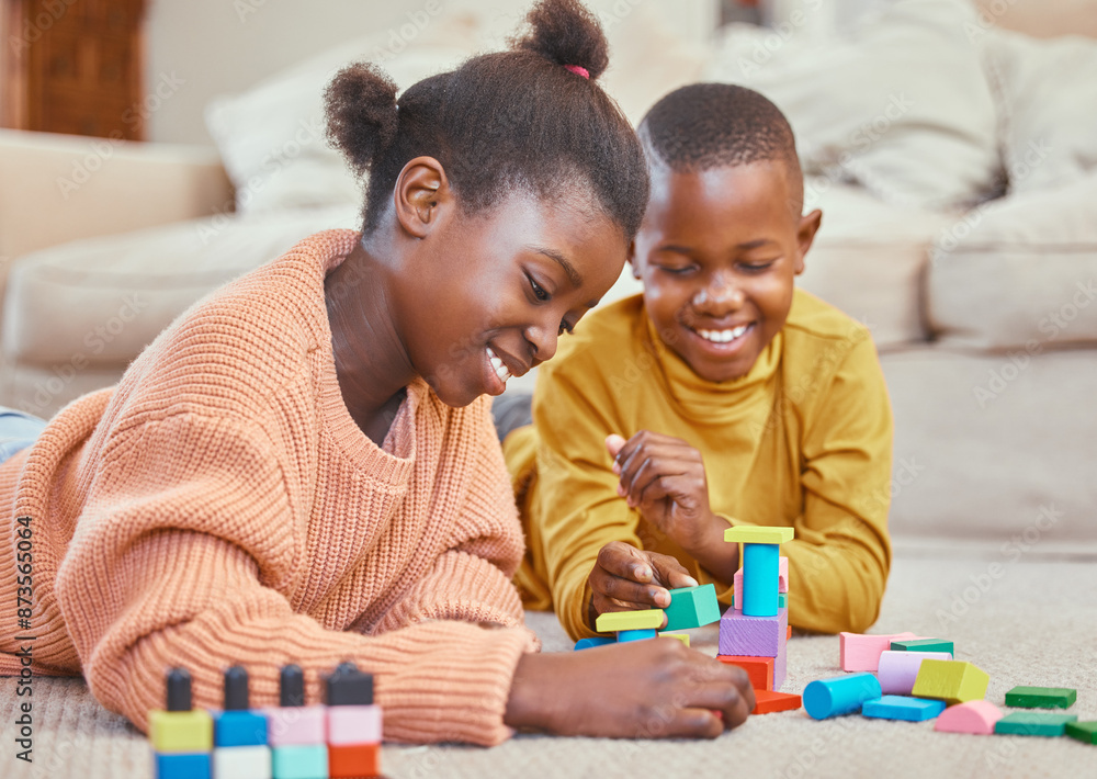 Obraz premium Kids, playing and building blocks in home for growth, child development and learning for motor skills. African children, toys and colorful puzzle in education, skill and cognitive ability for bonding