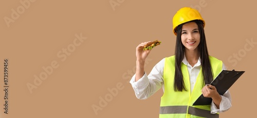 Female engineer with tasty ...