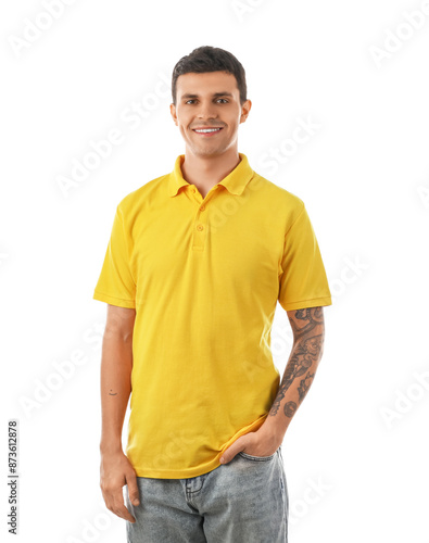 Handsome young man in stylish yellow t-shirt on white background