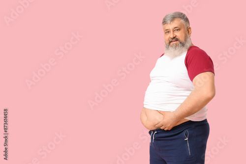 Overweight happy mature man...