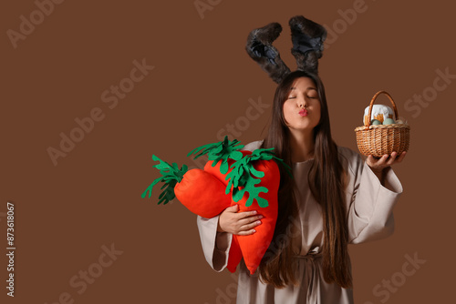 Young woman in Easter bunny...