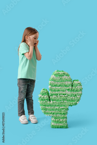 Shocked little girl with pi...