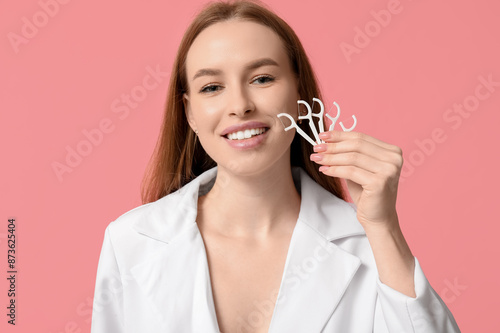 Young woman with toothpicks...