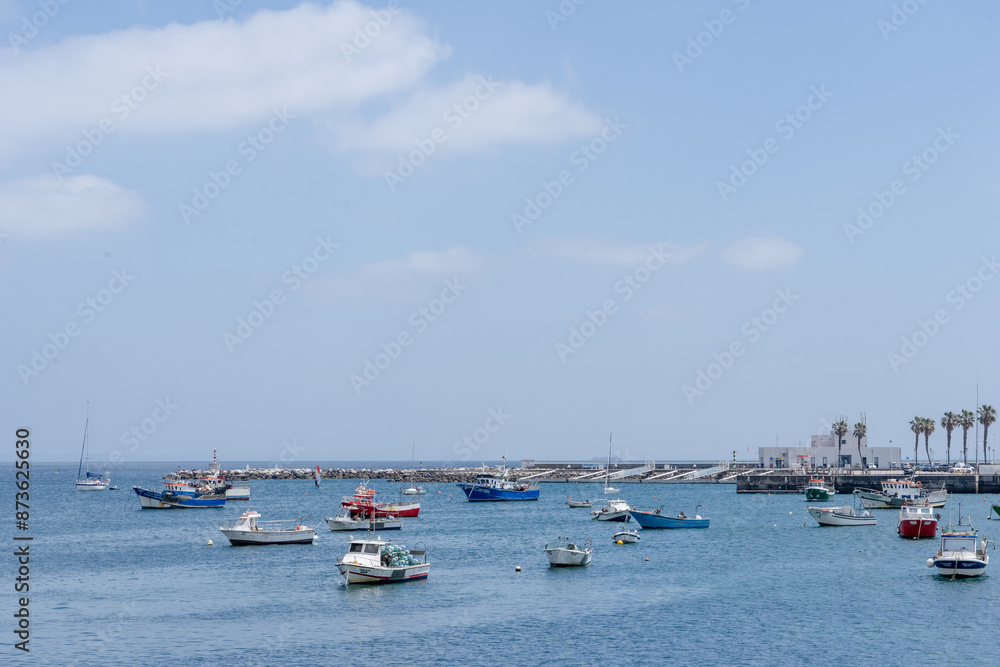 Fototapeta premium Fishing boats floating in the fish port of Cascais,Cascais municipality, Portugal
