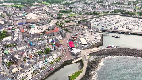 Aerial view of the Big wheel and Amusements at the Funfair in Bangor Marina and Harbour on the Co Down Coastline Northern Ireland  photo