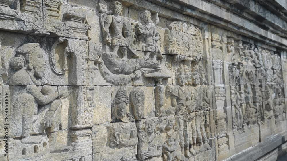 Detailed wall ornamented works and history of the famous Borobudur temple Yogyakarta Java Indonesia Detailed wall ornamented works and history of the famous Borobudur temple Yogyakarta Java Indonesia