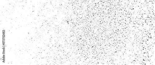 Gritty grunge gradient texture. Black grain overlay background. Distressed noise surface with dust, sand, particles, specks. Rough dirty speckled backdrop of concrete, cement, gravel. Vector wallpaper