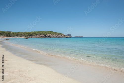 Crystal clear turquoise waters of the beaches of Ibiza in summer