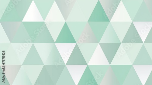 A  pattern of mint green and white triangles, creating a modern and abstract geometric design