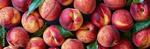 Fresh Ripe Peaches Arranged In A Row On A Dark Surface