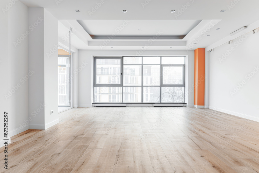 Empty property room in warm and neutral colors with a large window providing natural lighting and minimalist furniture. Real Estate conceptual composition with copy space. Empty property room in warm and neutral colors with a large window providing natural lighting and minimalist furniture. Real Estate conceptual composition with copy space.