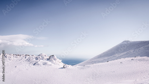 Majestic Snow-Capped Mountain Landscape with Dramatic Clouds and Shadows at Etna in Sicily Italy