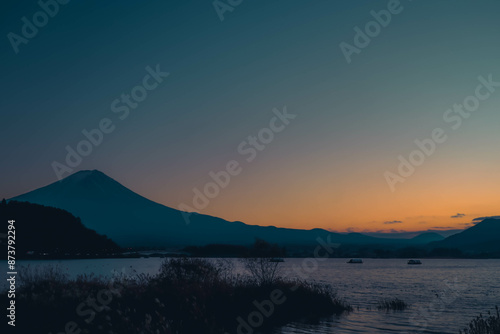 view of lake and  fuji mountain in evening