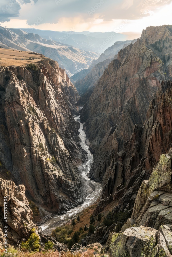 Fototapeta premium A rugged canyon with steep, craggy cliffs and a river flowing at the bottom, Generative AI