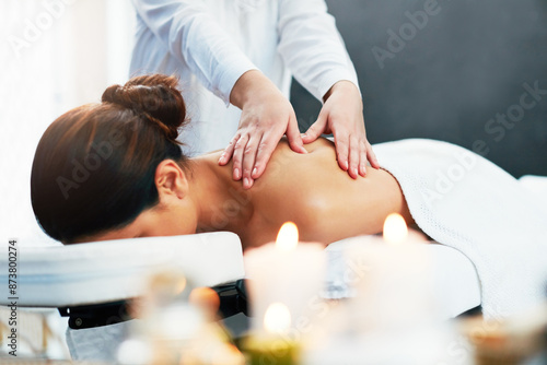 Woman, back massage and client for wellness in spa, hotel and hospitality service with professional masseuse. Body health, calming and relaxation for self care treatment with customer, beauty and zen