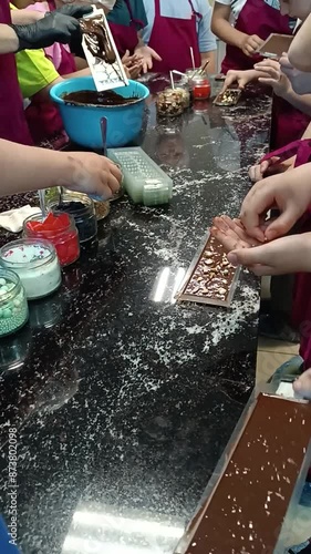 Master chocolatier shows a master class on making chocolate. vertical video