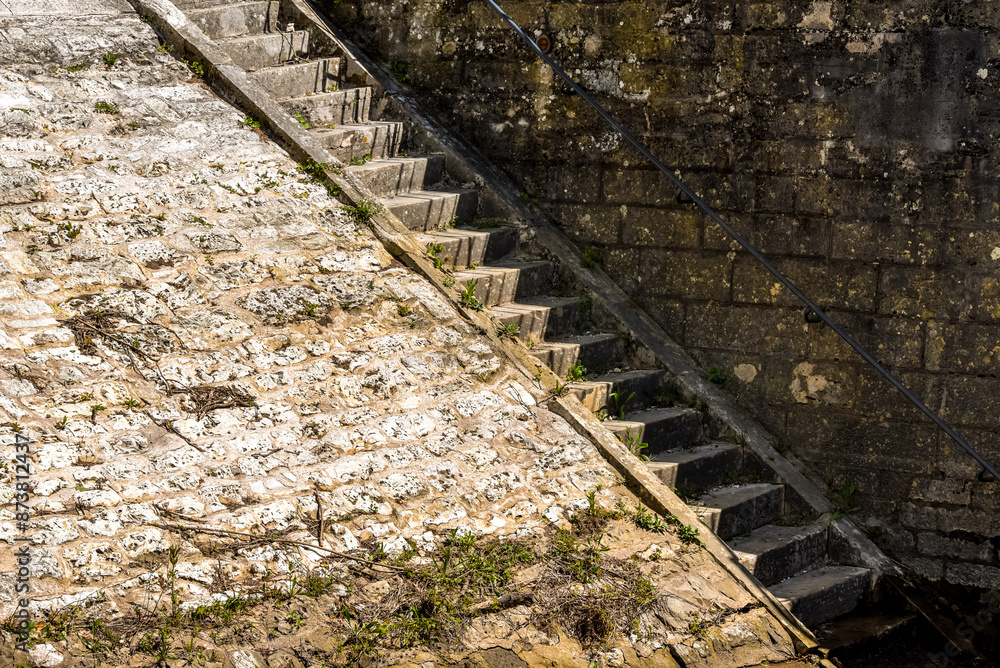 concrete stairs by a canal lock in France