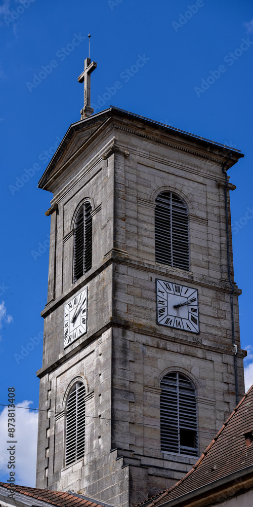 church tower with clock in a small village in France