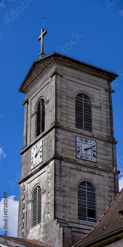 Obraz na płótnie church tower with clock in a small village in France w salonie
