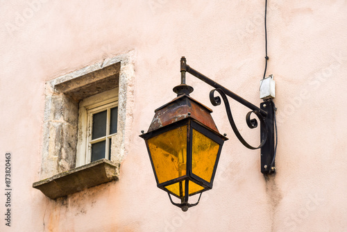 old street lamp on a wall